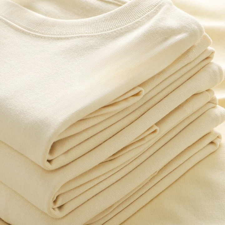 "Överdimensionerad t-shirt för män i bomull, enfärgad, avslappnad passform, kortärmad, rund hals, tungvikt tyg."