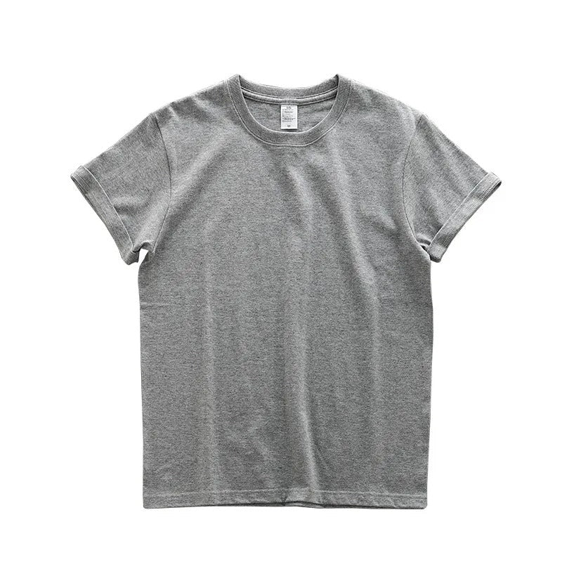 "Överdimensionerad t-shirt för män i bomull, enfärgad, avslappnad passform, kortärmad, rund hals, tungvikt tyg."