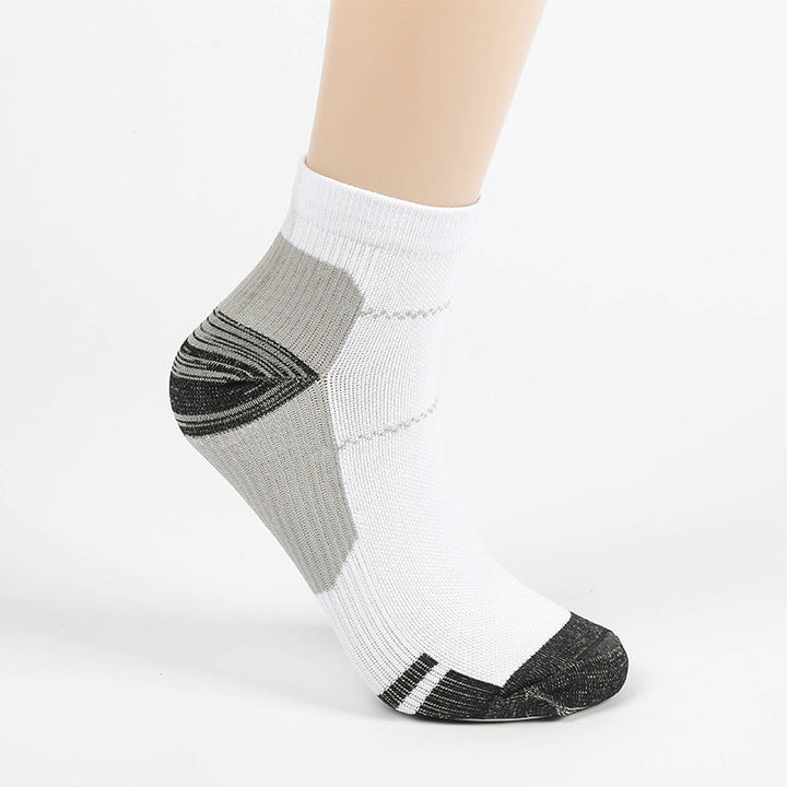 "Vibranta damhälsosportstrumpor med elastisk design och förstärkt häl för optimal komfort och stöd vid träning."