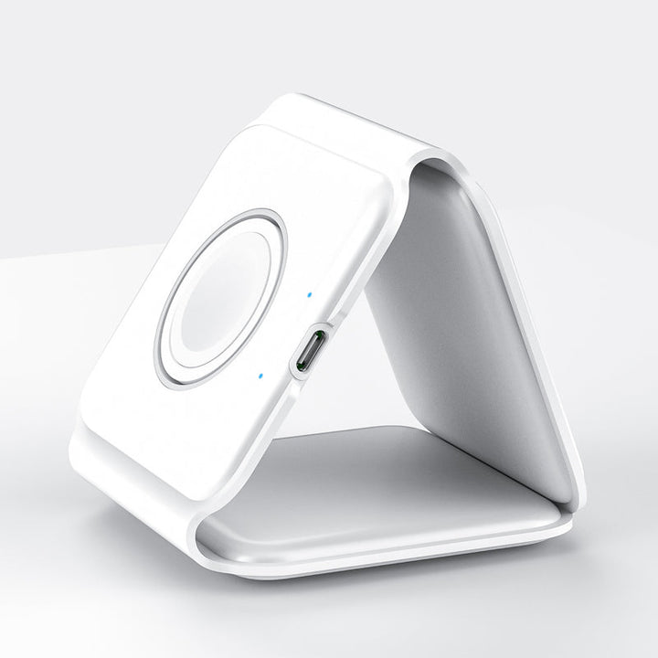 "Vikbar trådlös 3-i-1 laddstation i vit och svart, laddar mobil, AirPods, Apple Watch, sparar plats, stilren design."