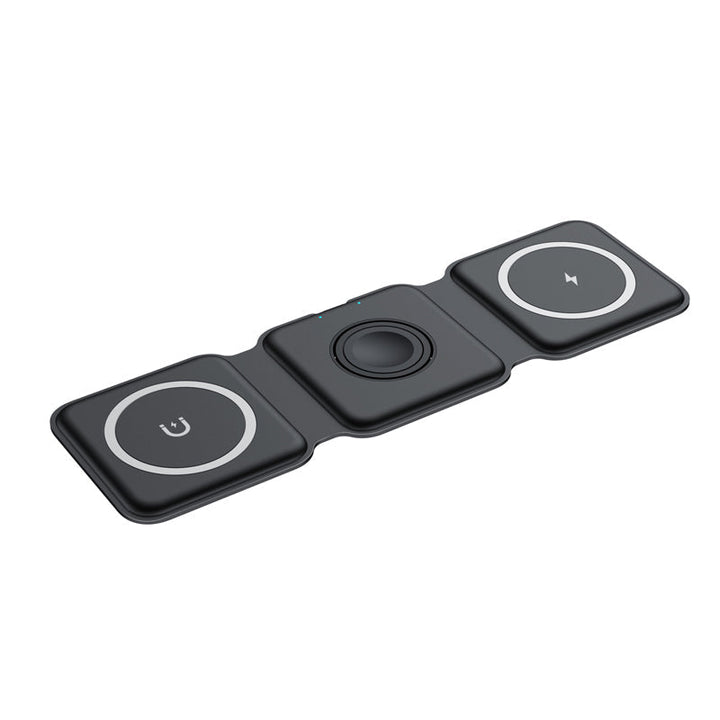 "Vikbar trådlös 3-i-1 laddstation i vit och svart, laddar mobil, AirPods, Apple Watch, sparar plats, stilren design."
