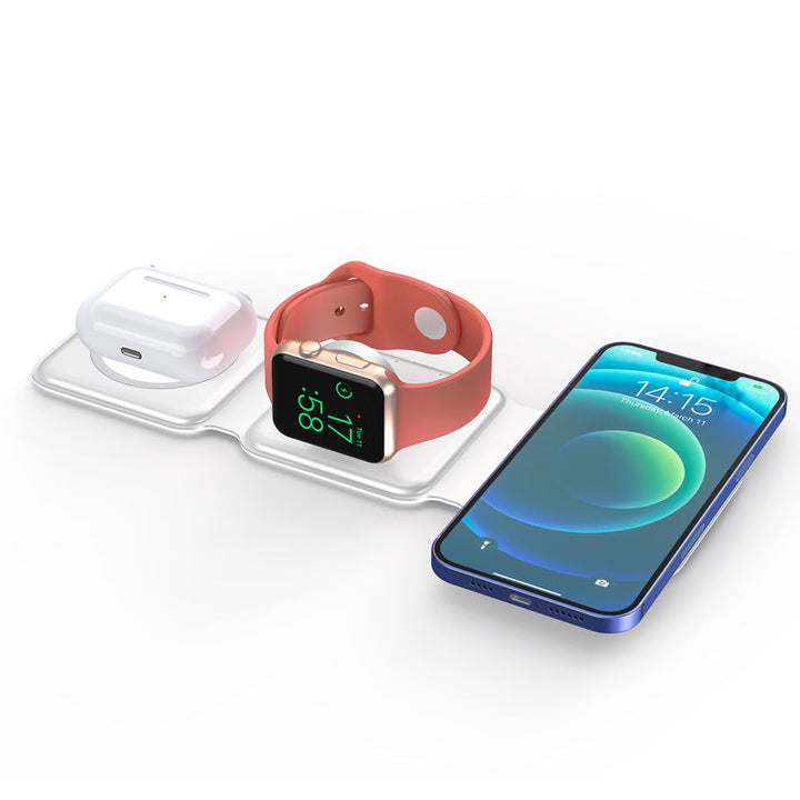 "Vikbar trådlös 3-i-1 laddstation i vit och svart, laddar mobil, AirPods, Apple Watch, sparar plats, stilren design."