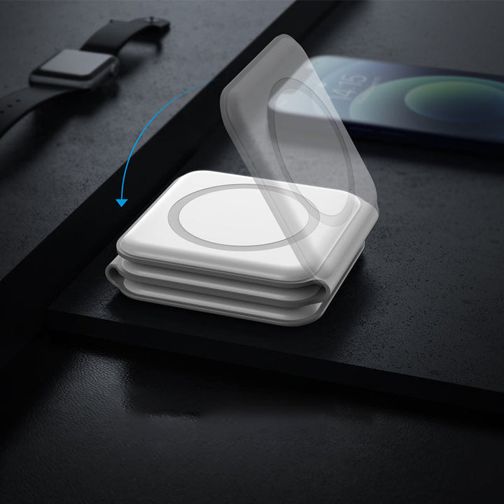 "Vikbar trådlös 3-i-1 laddstation i vit och svart, laddar mobil, AirPods, Apple Watch, sparar plats, stilren design."