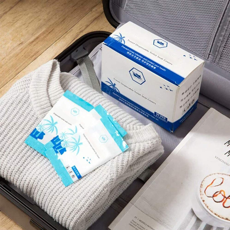 "Vikbart engångstoalettsits underlägg i vit färg, 40x48 cm, för hygien och komfort, idealiska för resor och hem"