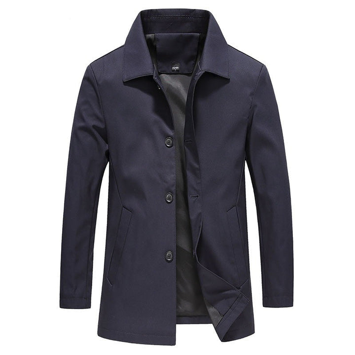 Vindtät lång herrjacka för hösten, enfärgad och stilren. Perfekta ytterkläder för herrar, höstmode.