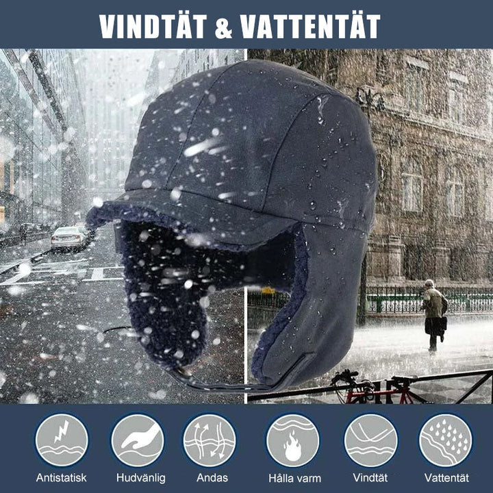 Vindtät unisex vintermössa med svarta öronlappar och avtagbart ansiktsskydd, perfekt för kallt väder.