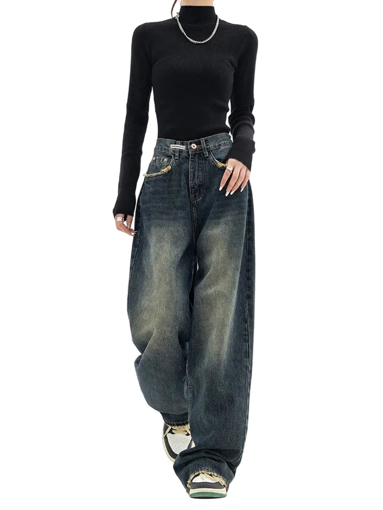Vintage baggy damjeans med hög midja och avslappnad passform, perfekt för streetwear.