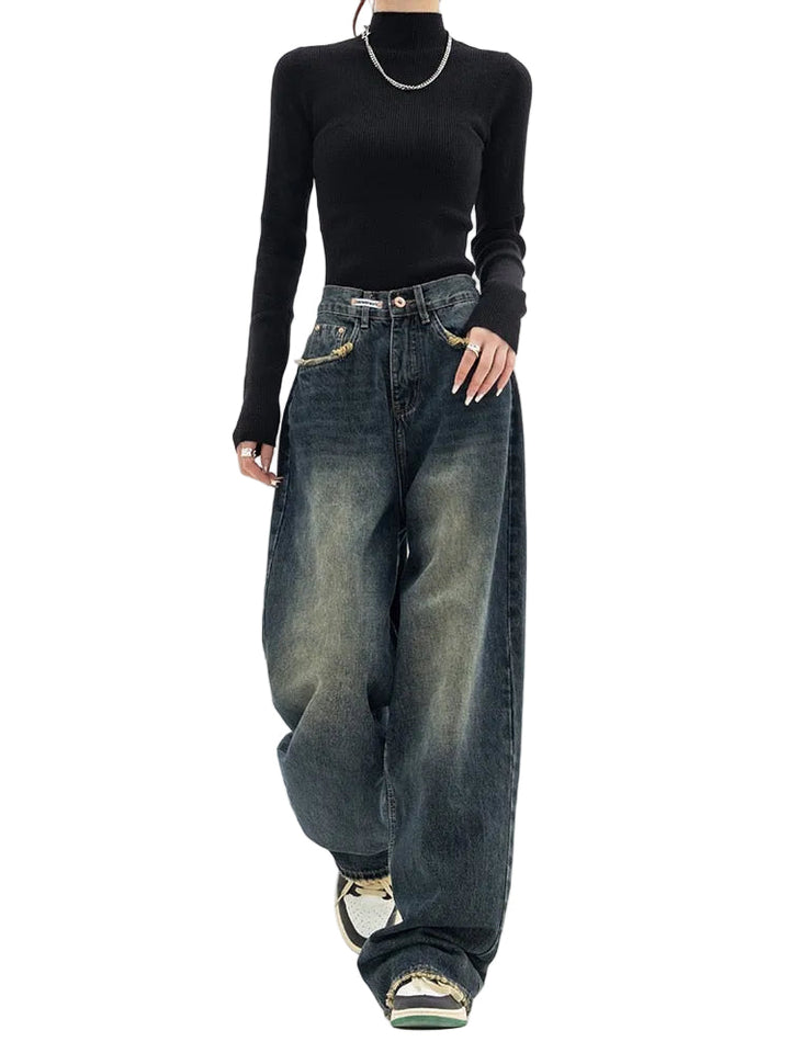 Vintage baggy damjeans med hög midja och avslappnad passform, perfekt för streetwear.