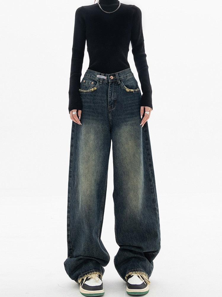 Högmidjade vintage damjeans med en bekväm, avslappnad passform för dammode.