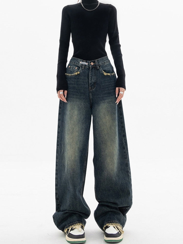 Högmidjade vintage damjeans med en bekväm, avslappnad passform för dammode.