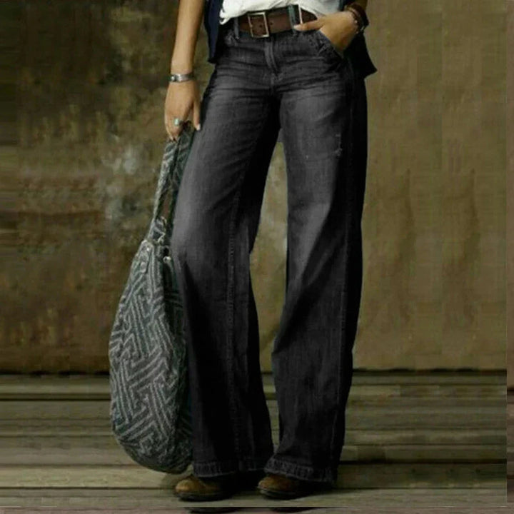 Höstens mode: detaljbild av smickrande Breda Jeans för Kvinnor med elegant, vid passform och vintagekänsla