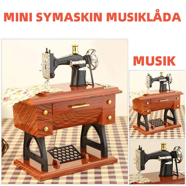 "Vintage mini symaskin musiklåda i klassisk design, perfekt presentidé med glansig yta och handvev för charmig musik."