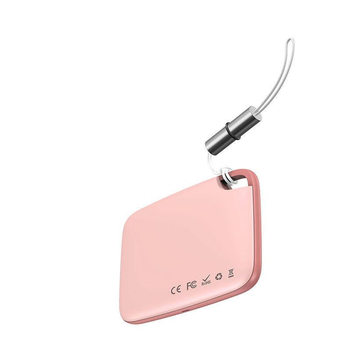 "Vit Bluetooth-spårare för förlorade föremål, kompakt och bärbar, idealisk för nycklar, husdjur och fordon."