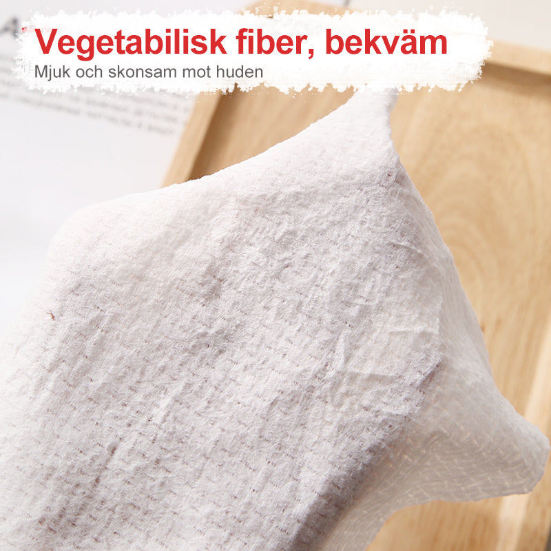 "Vit kompakt engångshandduk för resor, praktisk och platssparande, perfekt för hygien i farten."