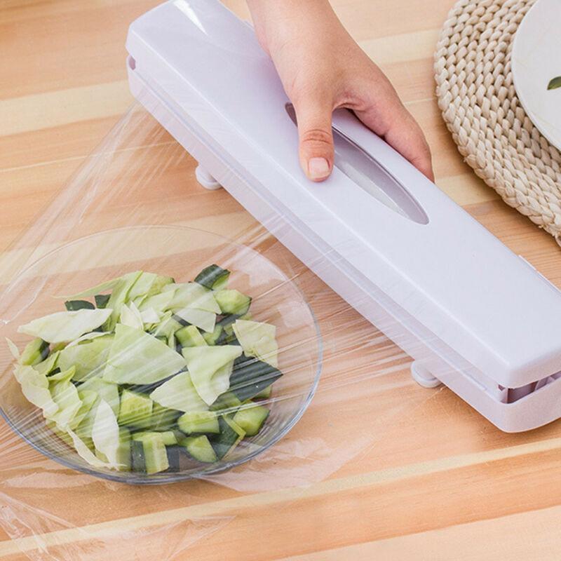 "Vit plastfoliebehållare med säker klipputsättning, kompakt design för effektiv matförpackning i köket."