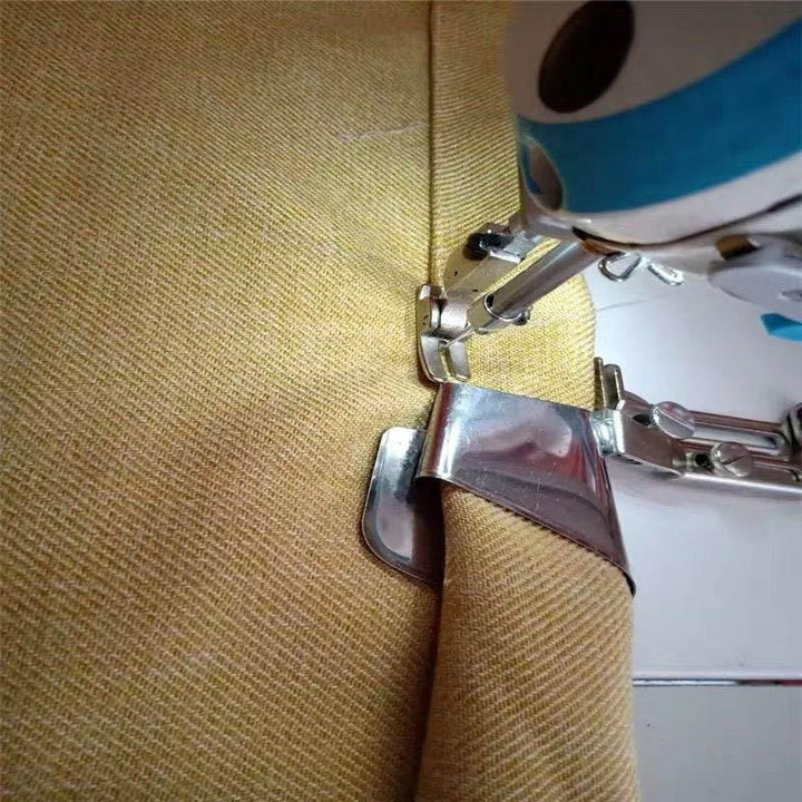 "Vit symaskin för effektiv sömning och precisionsarbete, perfekt för hemmabruk och professionella textilprojekt."