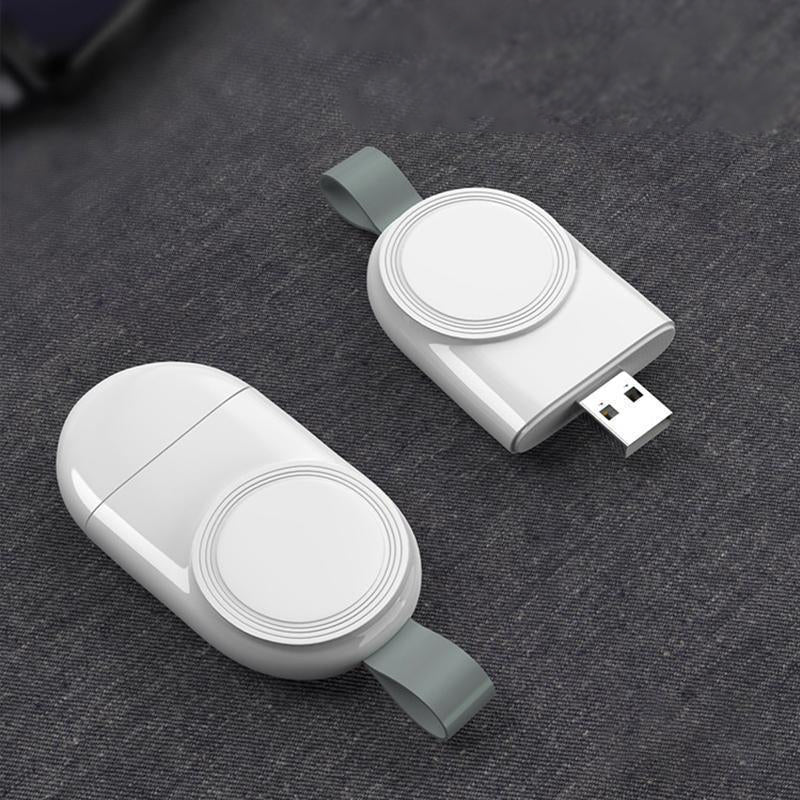 "Vit trådlös laddare för Apple-klocka, magnetisk och bärbar med kompakt design, perfekt för resor och snabb laddning."