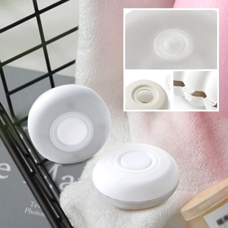 "Vita, kompakta resekapslar för flytande produkter. Unisex, bärbara förvaringslösningar med unik design i plast."