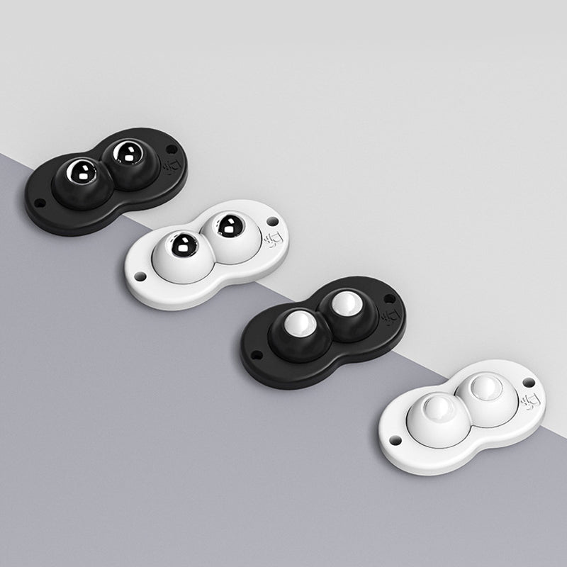 "Vita och svarta självhäftande mini 360° gummihjul; idealiska för enkel förflyttning av möbler och lådor i hemmet."