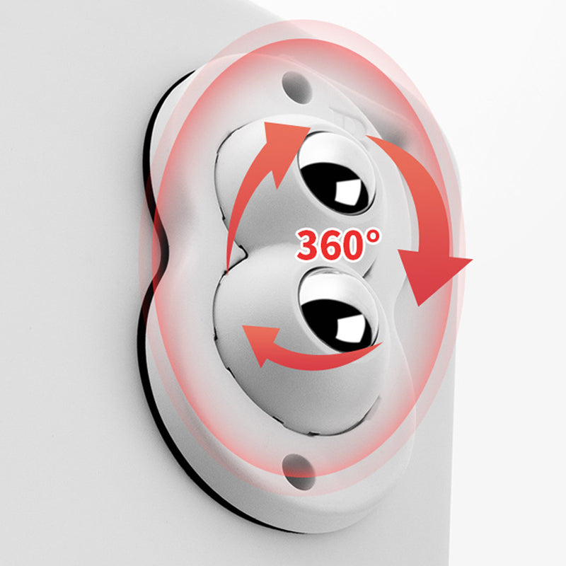 "Vita och svarta självhäftande mini 360° gummihjul; idealiska för enkel förflyttning av möbler och lådor i hemmet."