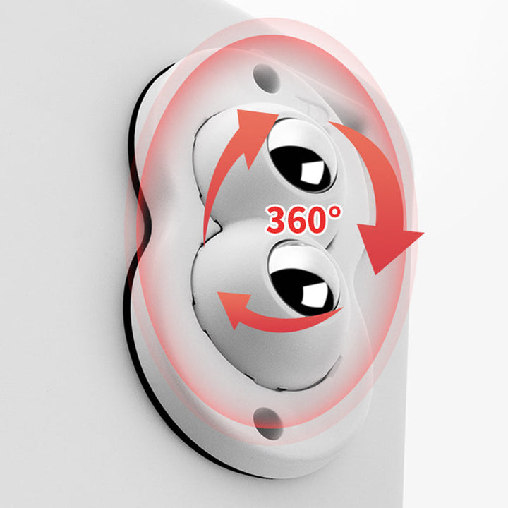 "Vita och svarta självhäftande mini 360° gummihjul; idealiska för enkel förflyttning av möbler och lådor i hemmet."