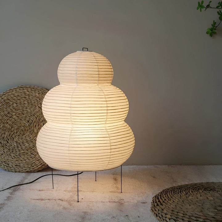 Zen Glow rispapperslampa, en minimalistisk golvlampa i japansk design för lugn stämningsbelysning.